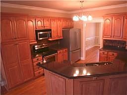 Kitchen with all appliances remain, Silestone countertops, and more