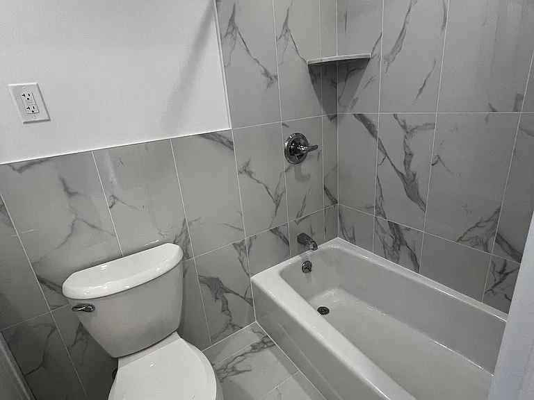 348 E 65th St #17 — Photo 21