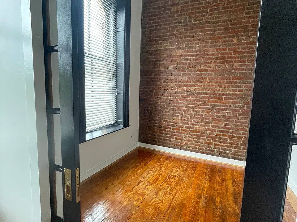 Downstairs office with French pocket doors, could be a guest room