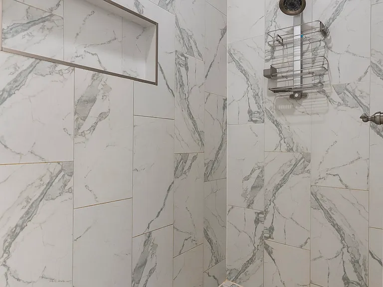 Huge walk in shower big enough to party