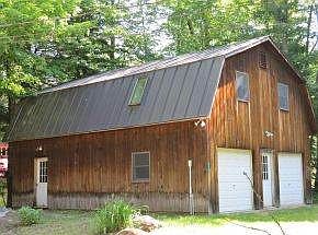 HEATED GARAGE W/EXTRA  ROOM