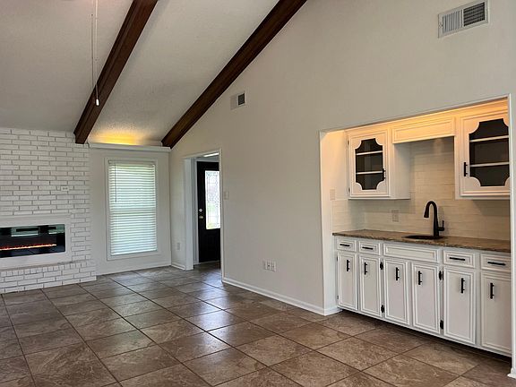 Living room right with wet bar