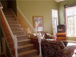 Great room stairs to Master Studio