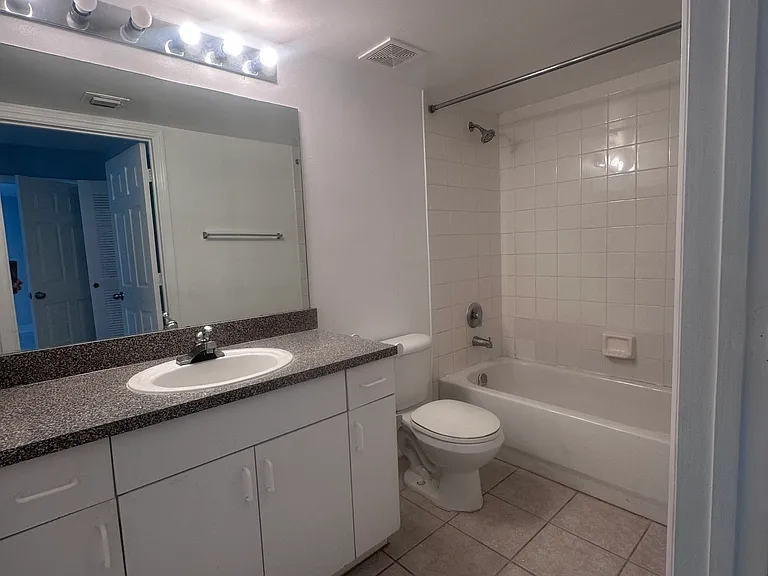 5011 Wiles Rd #207 — Photo 36