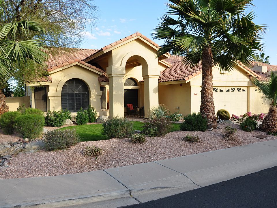 Great curb appeal & professional landscaping