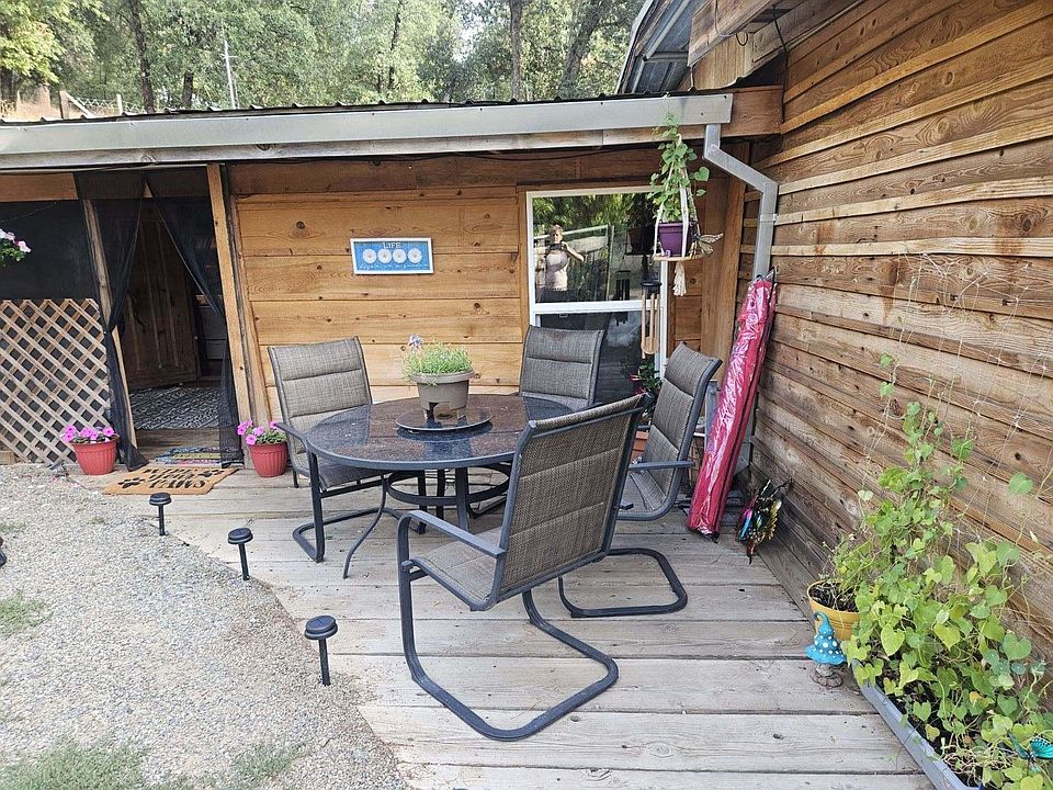 front yard leading into the covered porch