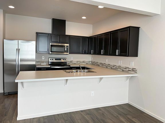 5th image of 2111 NE Four Seasons Ln