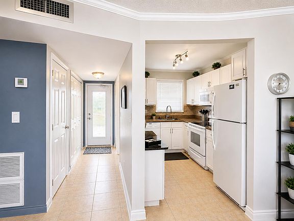 3rd image of 2651 SUNRISE LAKES Drive E #310
