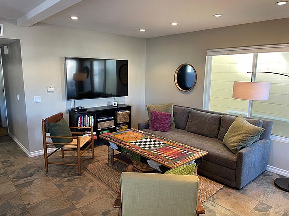 The living area portion of the great room. The couch is a queen sized sleeper couch.