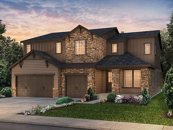 Two-story Messina plan shown in Elevation C with a four-car garage and stunning accents.