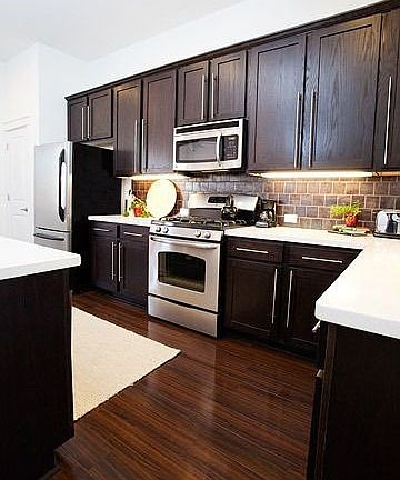 Dark Wood Cabinets, Stainless Appliances