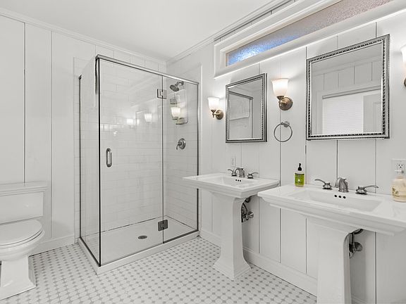 Primary ensuite bathroom with radiant heat floor