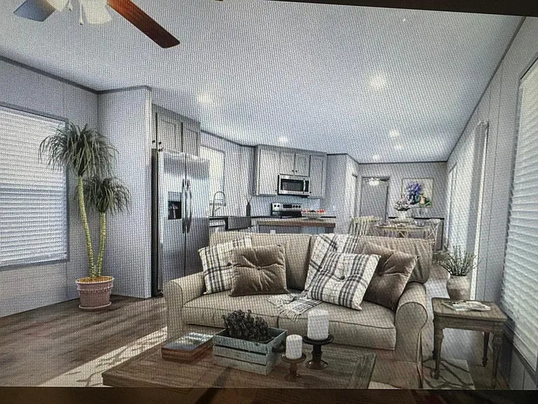 Ideas for furnishing. Open concept, kitchen, living, french doors to large backyard deck.