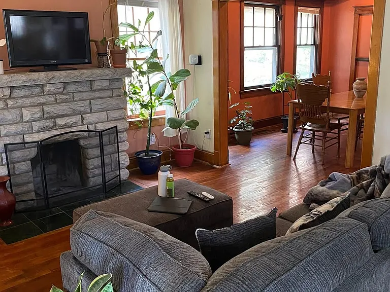 Open concept living room leading into the formal dining room