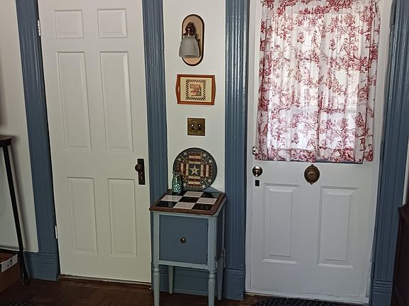 Front door and closet door in livingroom.