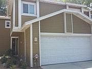 Front view of townhouse showing large 2 car garage