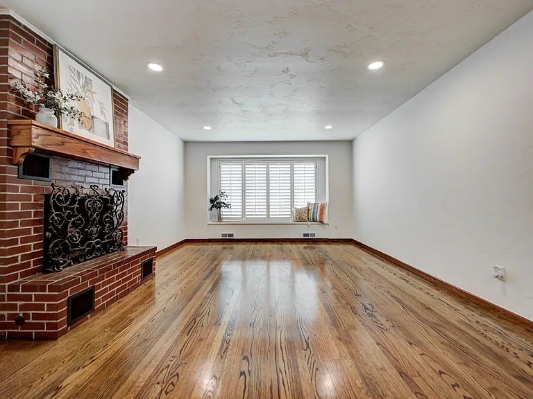 Living Room with Gas Fireplace and Large Window