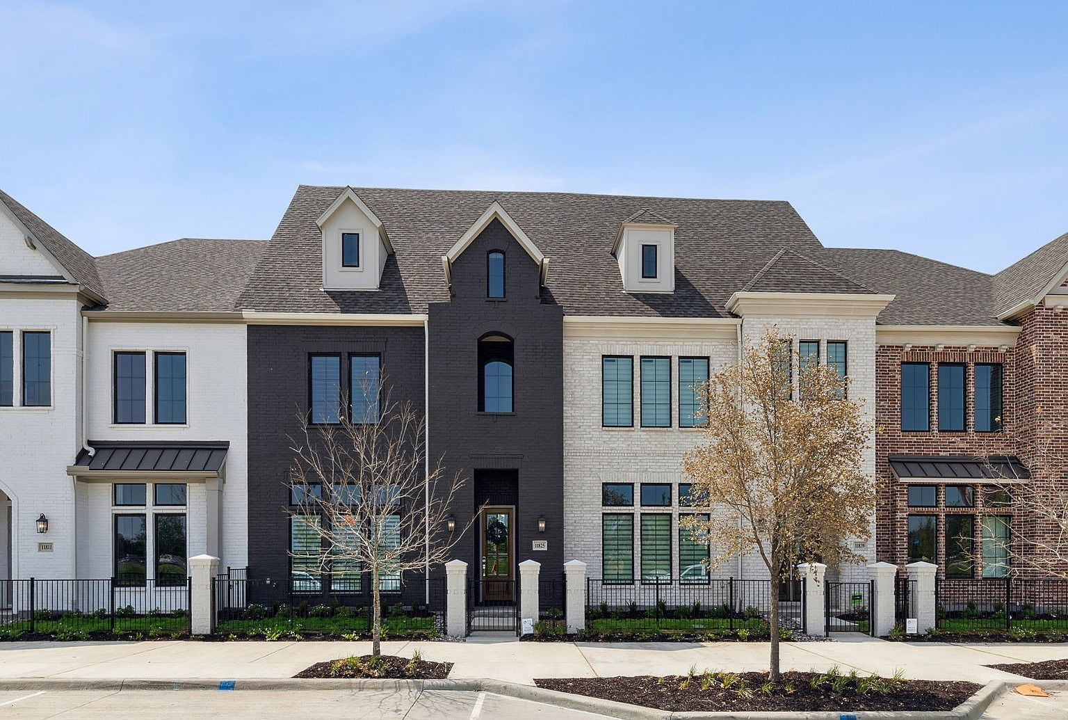 Newman Village Luxury Townhomes by Centre Living Homes in Frisco TX