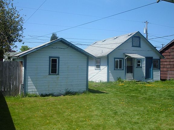 Back house with detached garage