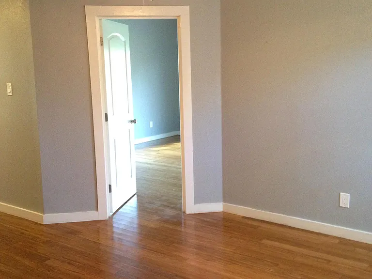 Living area and master bedroom entry door