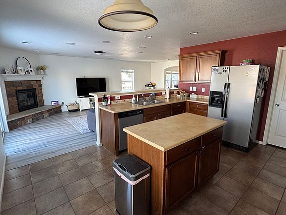 Kitchen into living area with gas fireplace