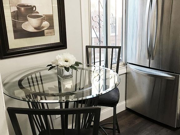 Breakfast Nook & Stainless Steel Refrigerator