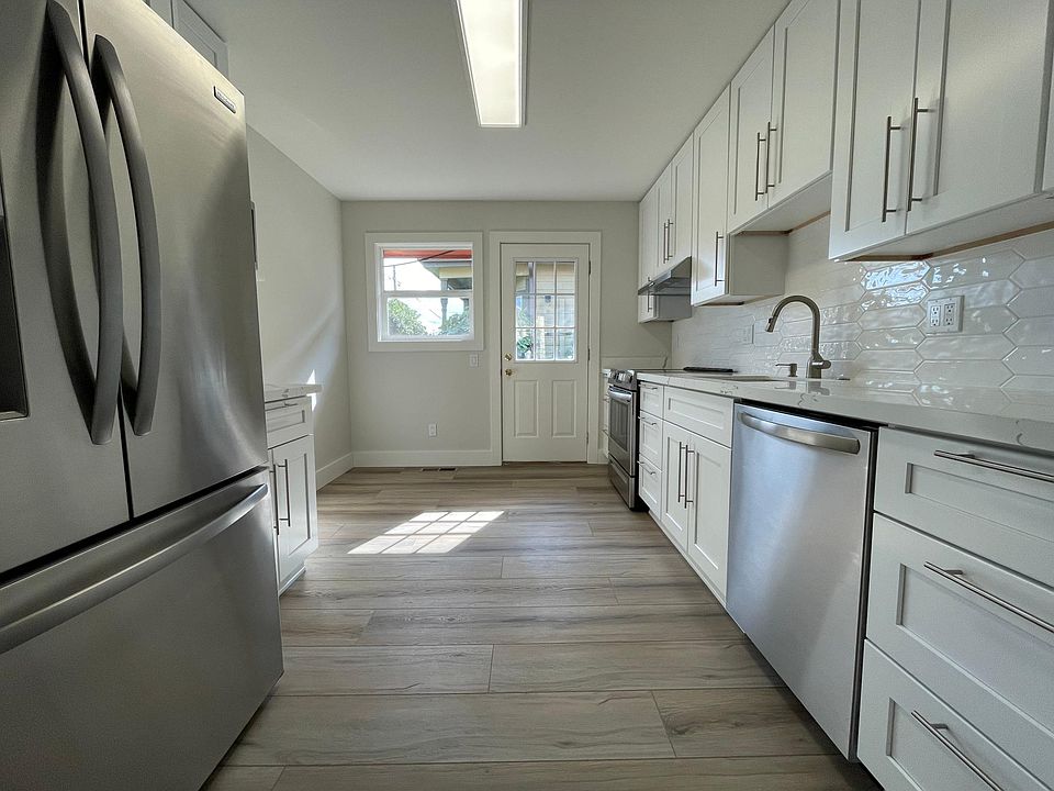 Unit 413 has refinished hardwood flooring rather than LVT like this unit 417