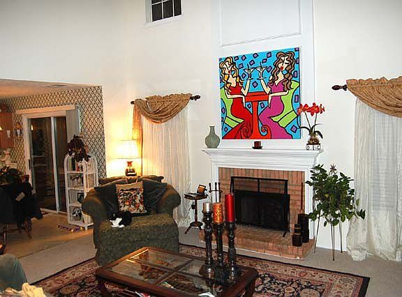 Cathedral ceiling and fireplace add to the ambiance of the Great Room.