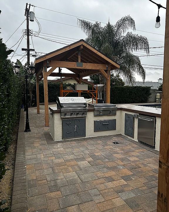 Outdoor kitchen with patio