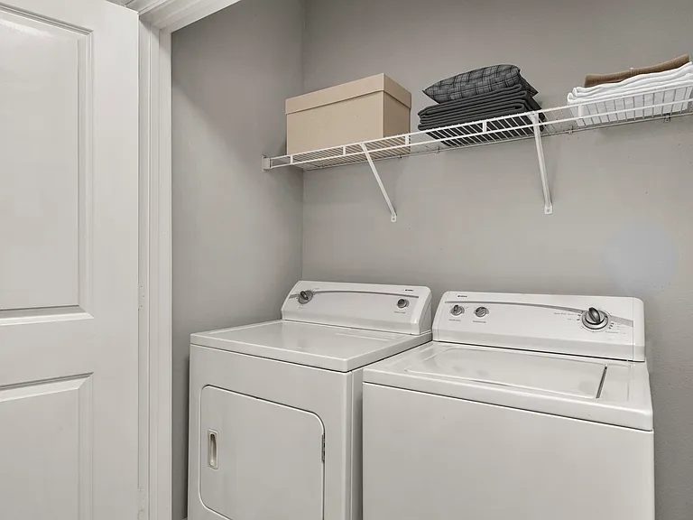 Simplify your routine with a washer and dryer inside your home.