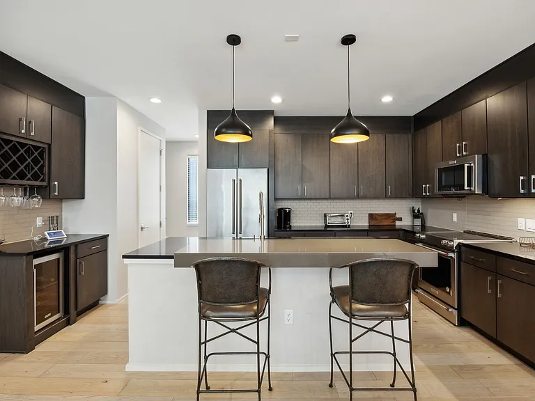Kitchen w/ island and wine cooler