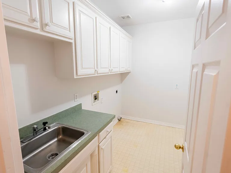 Laundry Room with enough cabinets and storage
