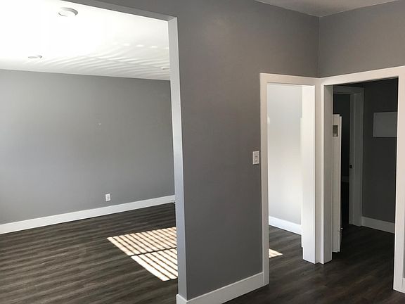 Kitchen looking into living room