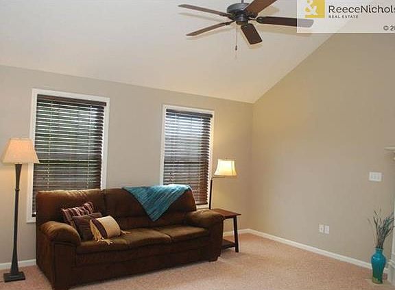 Immaculate interior - neutral paint, high end blinds, and a ceiling fan.