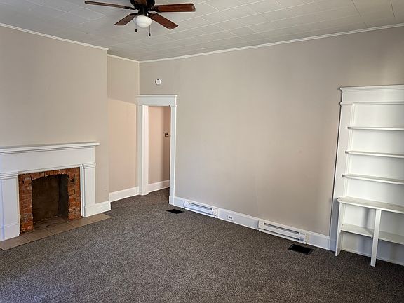 looking from the front door to the entry room. Notice the oversize moldings and 10 foot ceilings