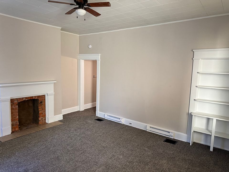 looking from the front door to the entry room. Notice the oversize moldings and 10 foot ceilings