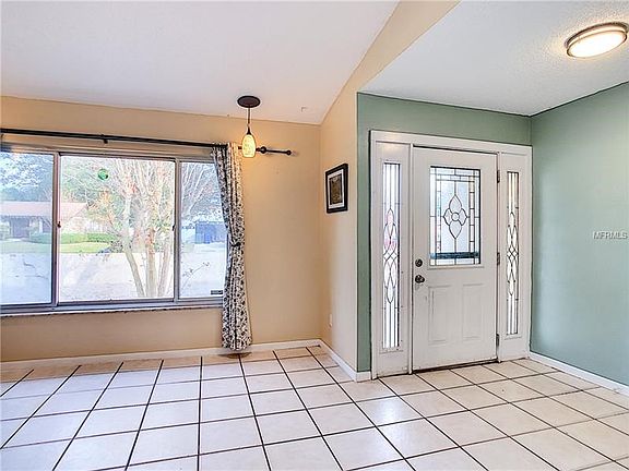 Spacious foyer entry leads directly to the formal living room.
