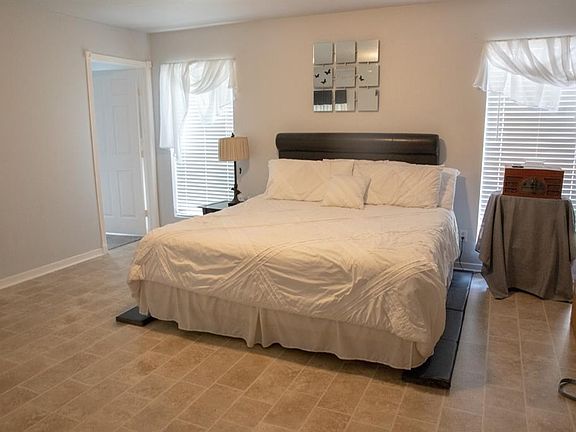 Master bedroom fits a king sized bed with plenty of room to spare.