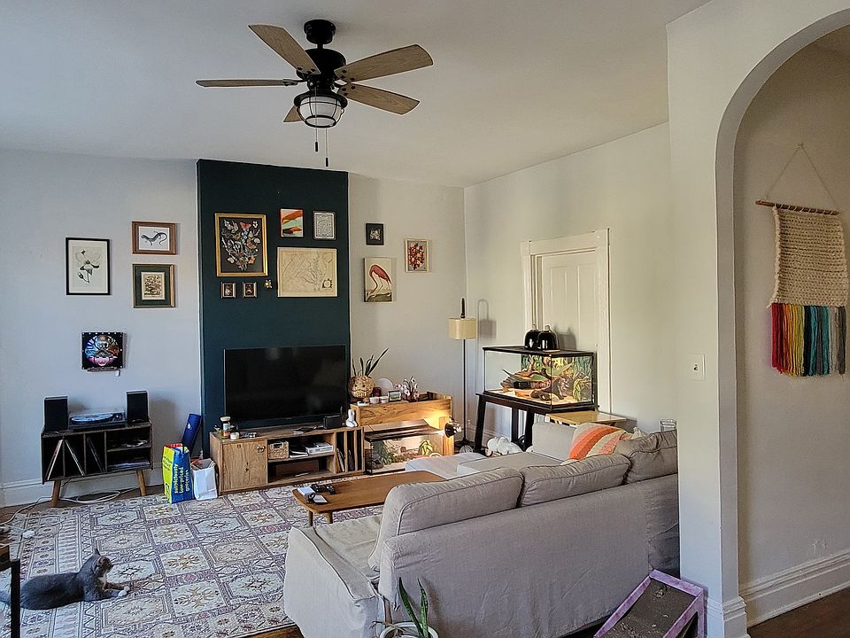 Rm #1- fitted with a sectional and cat!