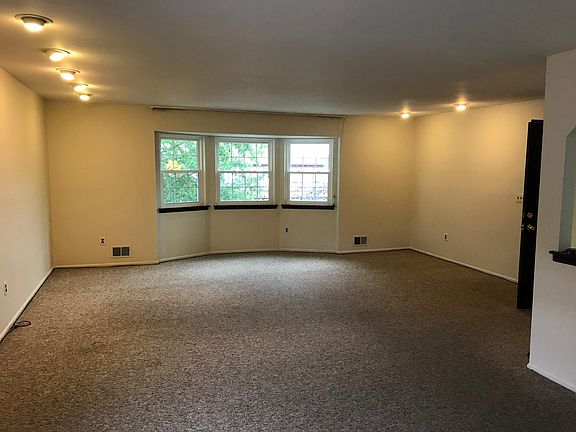 Spacious living room/dining area.