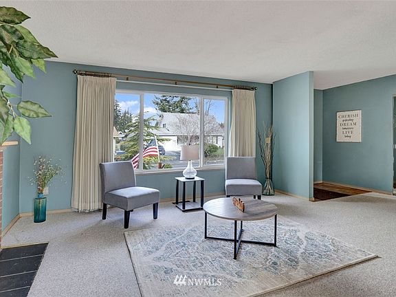Large picture window provides abundant natural light.