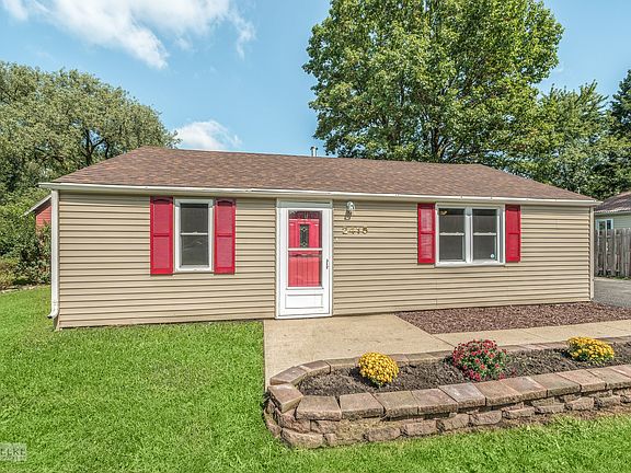 The brick paver planting area creates fabulous curb appeal!