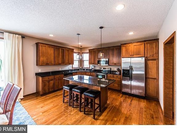 Closer view, granite, SS appliances.