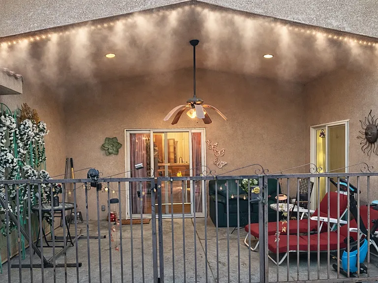 Huge covered patio with mist system, like in restaurant, gated to the pool