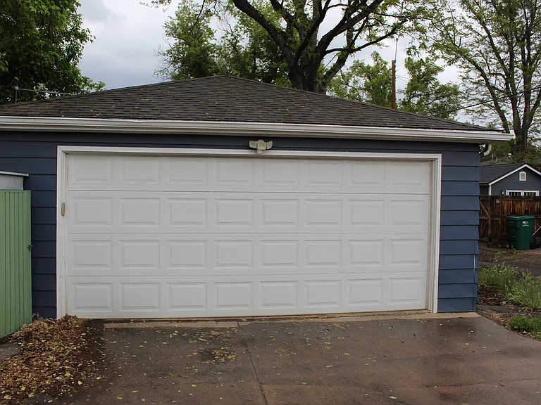 Large detached garage with alley access