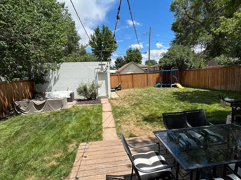 Huge backyard with two car detached garage. There is additional parking behind the fence as well!