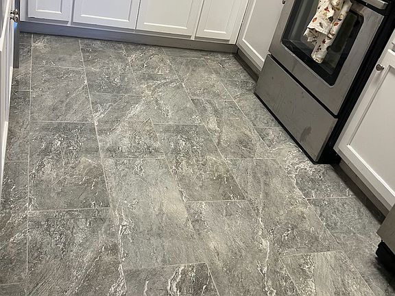 New tile floors in the kitchen and laundry room