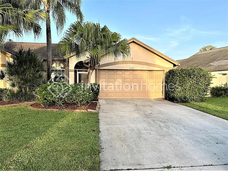 12841 Meadowbreeze Dr — Photo 1