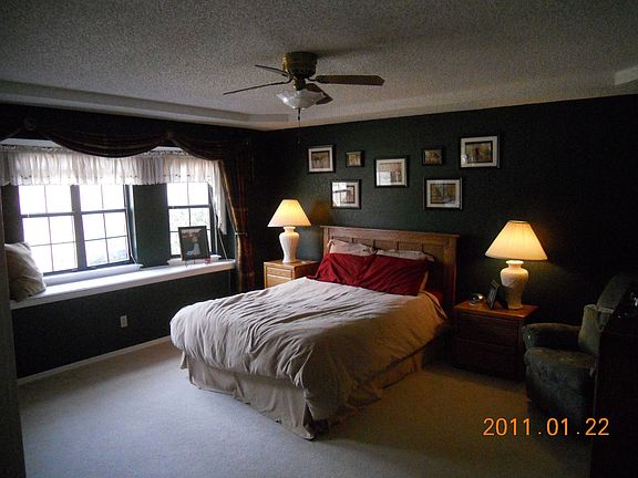 Master Bedroom with large bay windo.