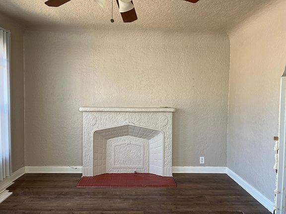 Faux fireplace in bedroom 1